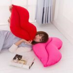 Woman with Lip Shaped Pillows